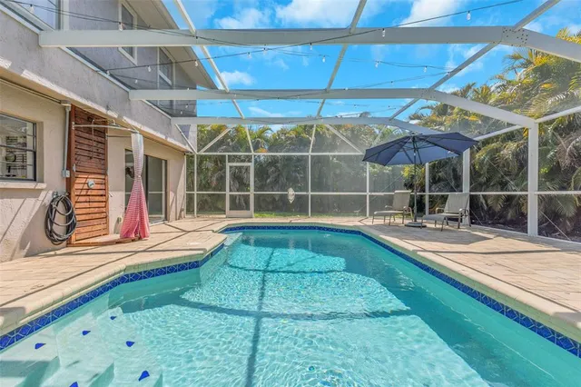 a bedroom with a bed and cabinets