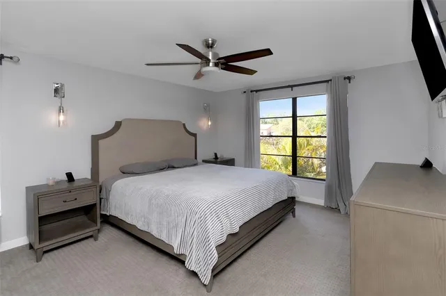 an aerial view of a residential apartment building with a yard