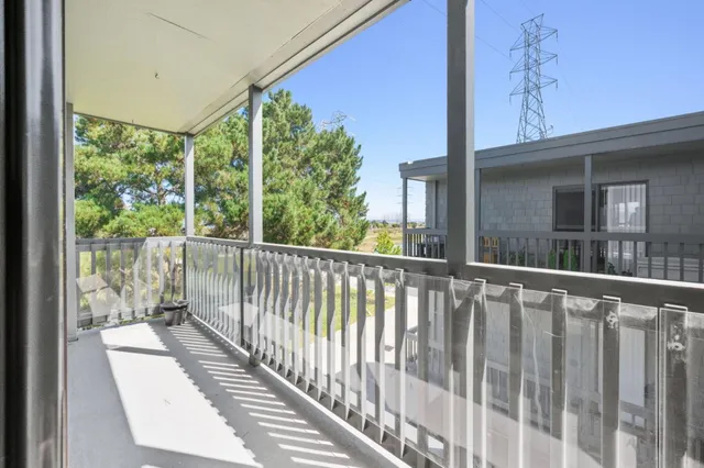 a kitchen with cabinets a sink and appliances