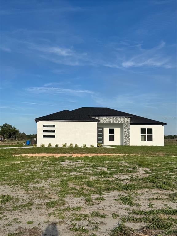 a front view of house with yard