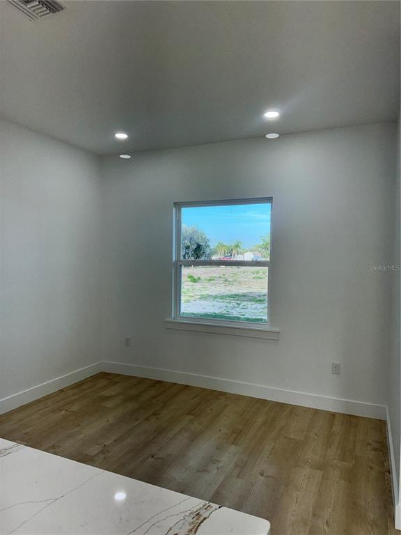 1721 McClellan Road Frostproof, FL 33843 - Photo 15 of 41 a view of an empty room