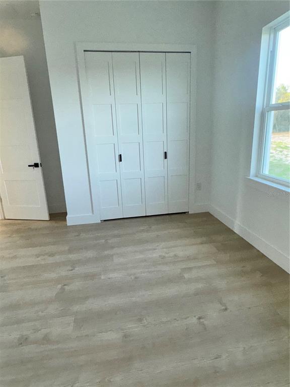 1721 McClellan Road Frostproof, FL 33843 - Photo 21 of 41 a view of an empty room