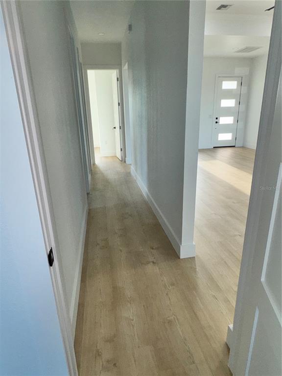 1721 McClellan Road Frostproof, FL 33843 - Photo 22 of 41 wooden floor in a gallery