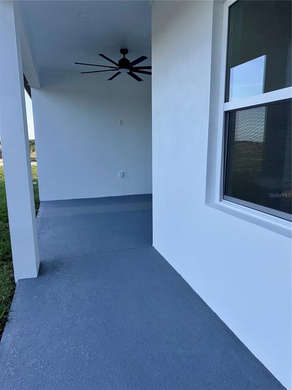 1721 McClellan Road Frostproof, FL 33843 - Photo 38 of 41 a view of a room with a hallway
