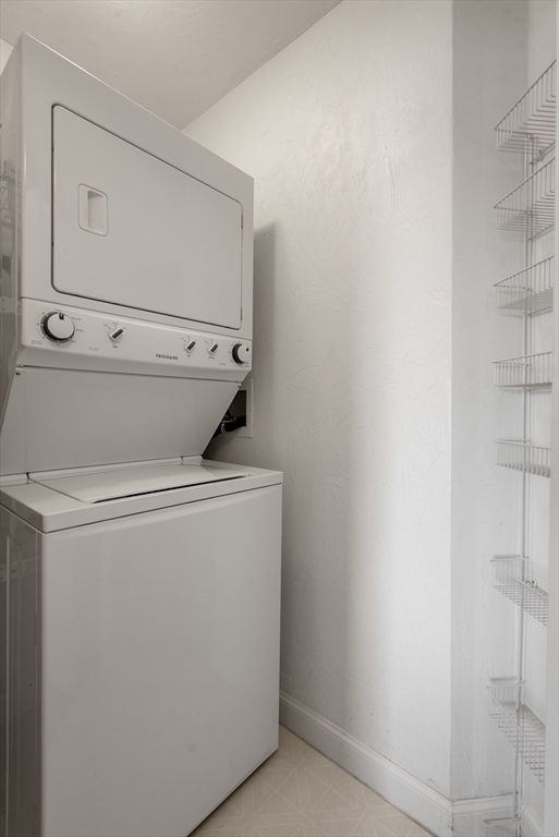 5 Strawberry Lane, Unit E Hudson, MA 01749 - Photo 23 of 42 a utility room with dryer and washer
