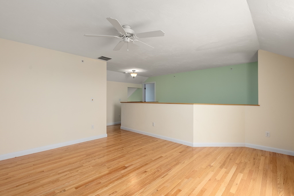 5 Strawberry Lane, Unit E Hudson, MA 01749 - Photo 26 of 42 a view of an empty room