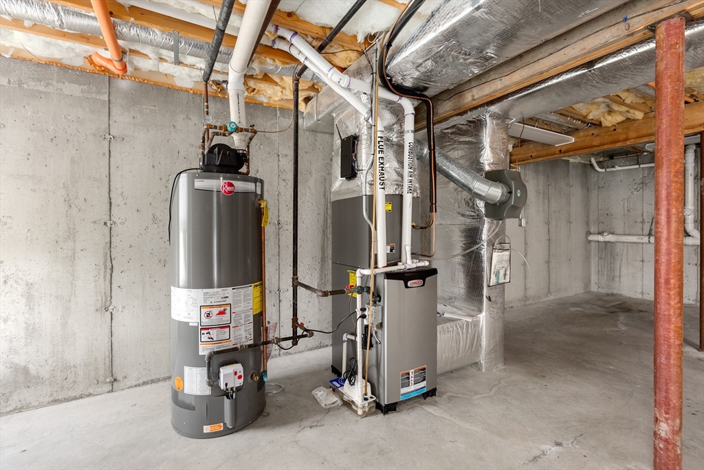 5 Strawberry Lane, Unit E Hudson, MA 01749 - Photo 32 of 42 a view of storage and utility room