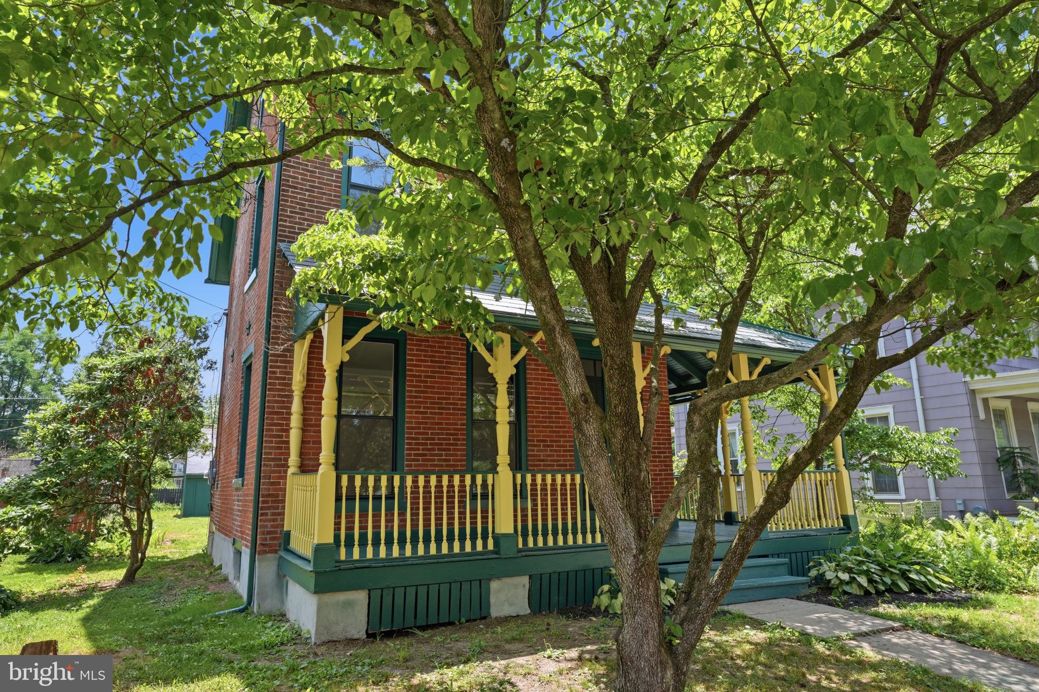124 Cedar Road Riegelsville, PA 18077 - Photo 3 of 50 Charming brick home with lush greenery.