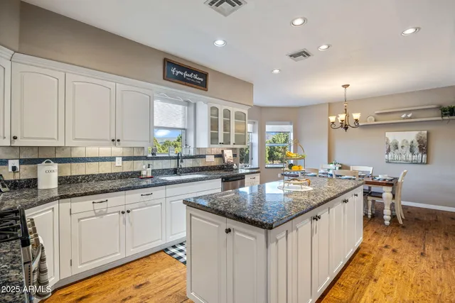 an aerial view of a house with mountain view