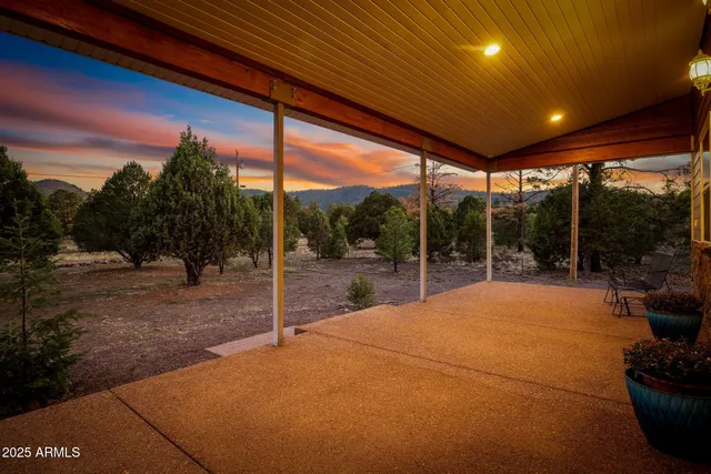 a bathroom with a sink vanity and mirror
