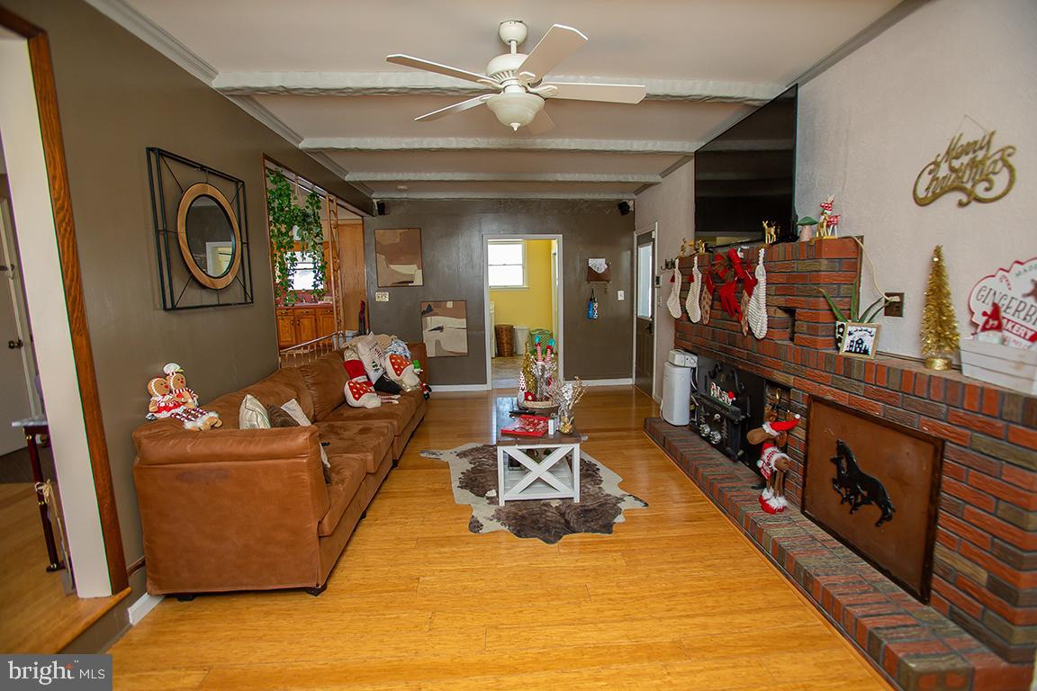 1232 Harding Road Vineland, NJ 08361 - Photo 14 of 29 a living room with furniture and a flat screen tv