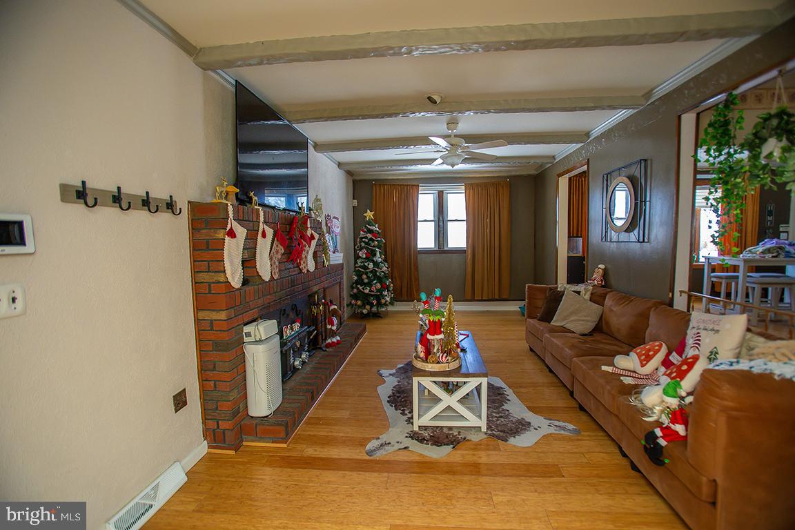 1232 Harding Road Vineland, NJ 08361 - Photo 15 of 29 a living room with lots of furniture and white walls