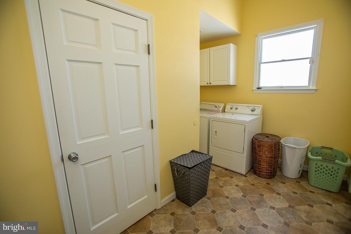 1232 Harding Road Vineland, NJ 08361 - Photo 17 of 29 a bathroom with a granite countertop sink and a mirror