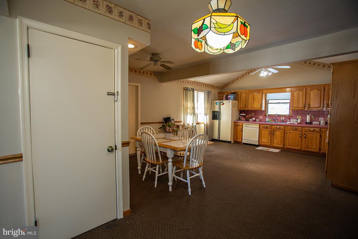 1232 Harding Road Vineland, NJ 08361 - Photo 20 of 29 a dining room with furniture and chandelier