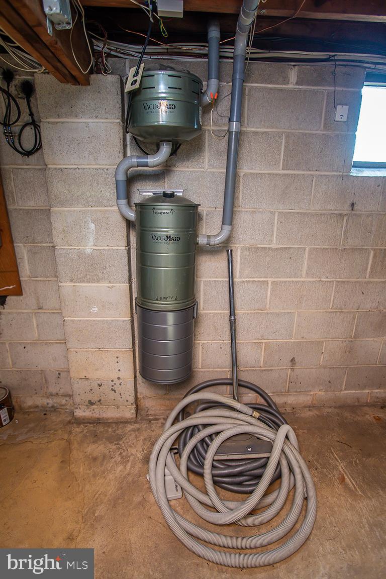 1232 Harding Road Vineland, NJ 08361 - Photo 27 of 29 a bathroom with a washing machine and cabinets