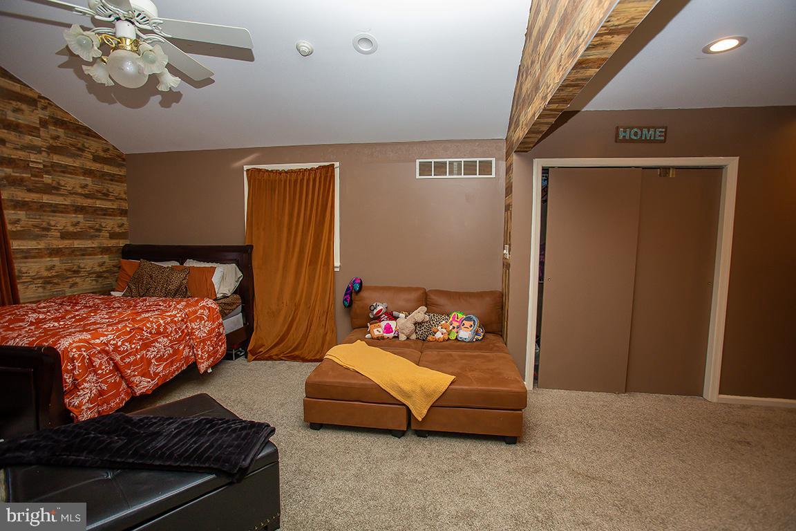 1232 Harding Road Vineland, NJ 08361 - Photo 9 of 29 a bedroom with bed and wooden floor