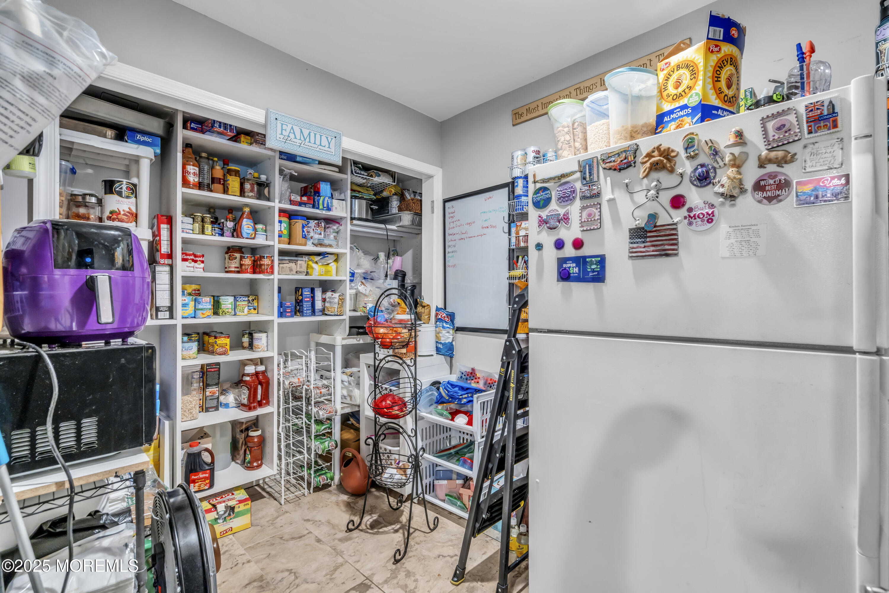 1 Sun Hollow Road Howell, NJ 07731 - Photo 16 of 47 a utility room with lots of clutter and refrigerator