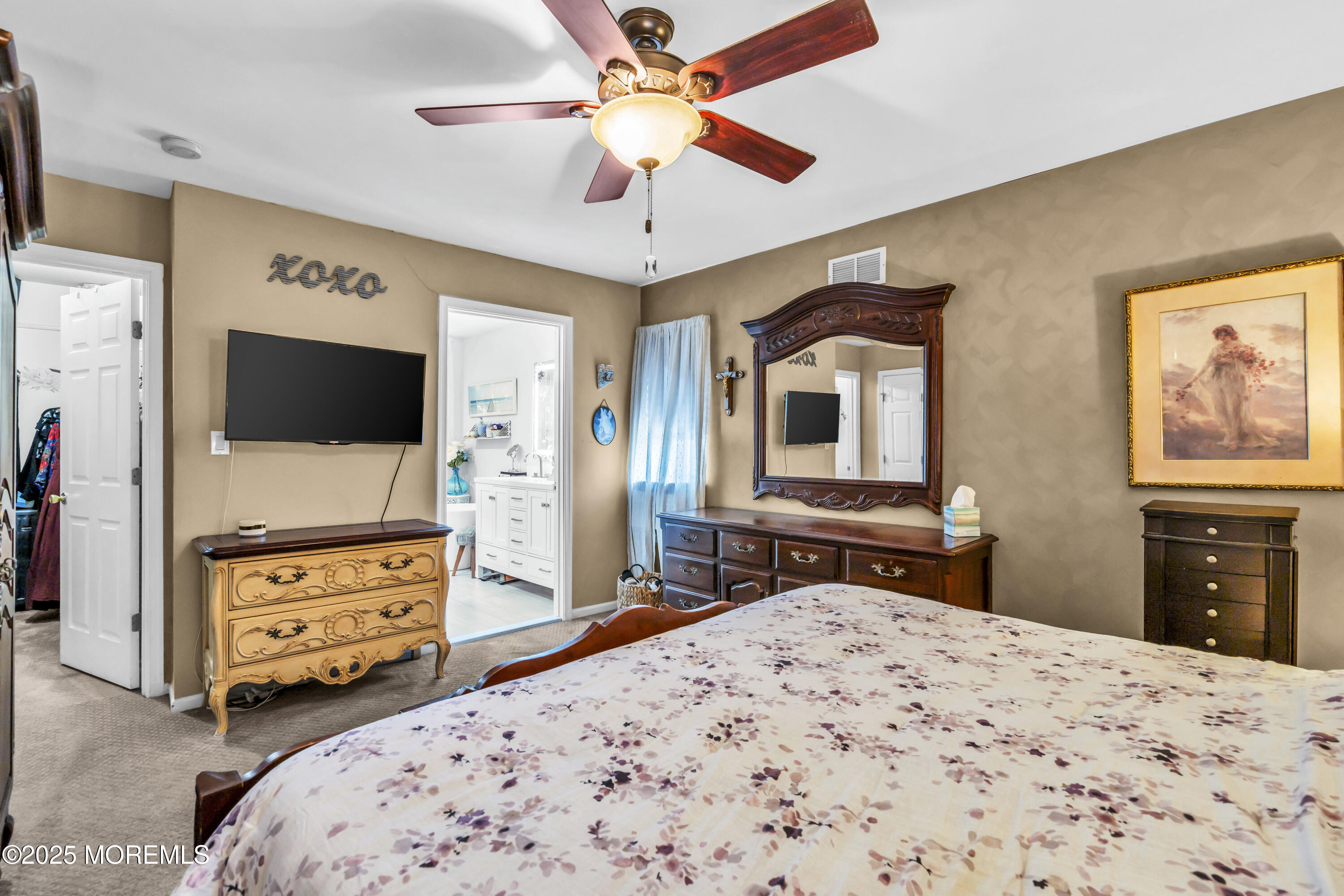 1 Sun Hollow Road Howell, NJ 07731 - Photo 25 of 47 a bedroom with furniture and a flat screen tv