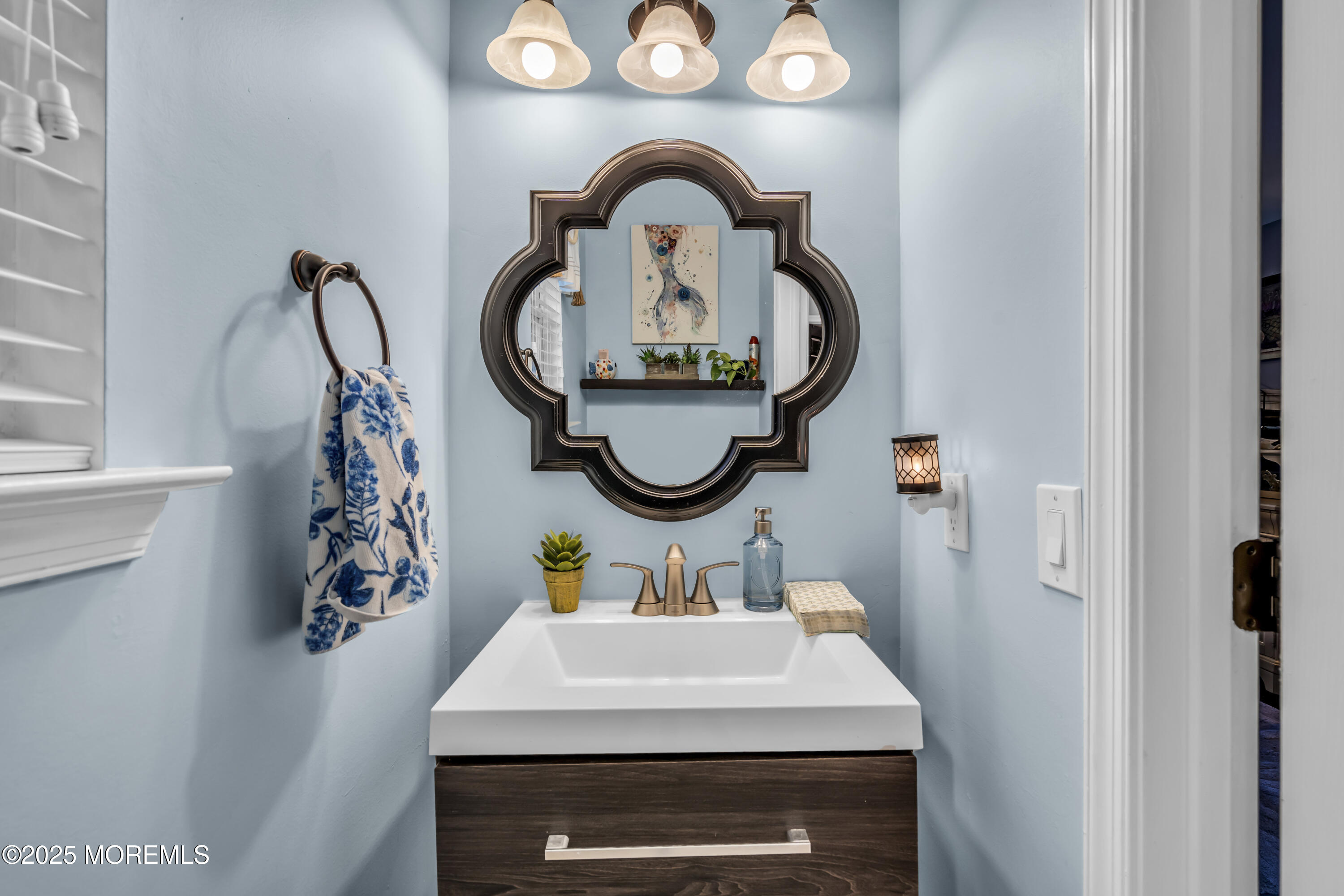 1 Sun Hollow Road Howell, NJ 07731 - Photo 29 of 47 a bathroom with a sink and a mirror