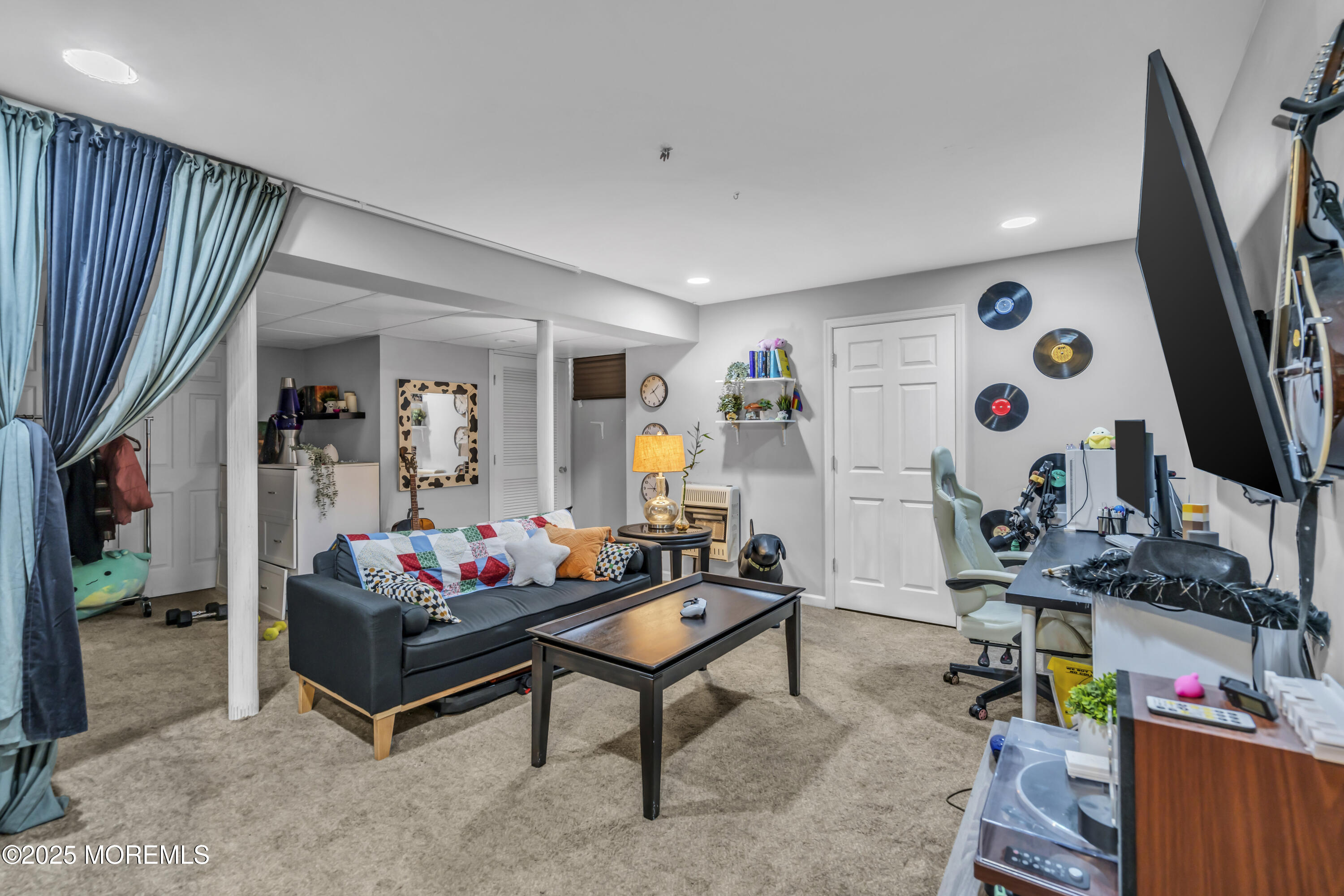 1 Sun Hollow Road Howell, NJ 07731 - Photo 30 of 47 a living room with furniture and a flat screen tv