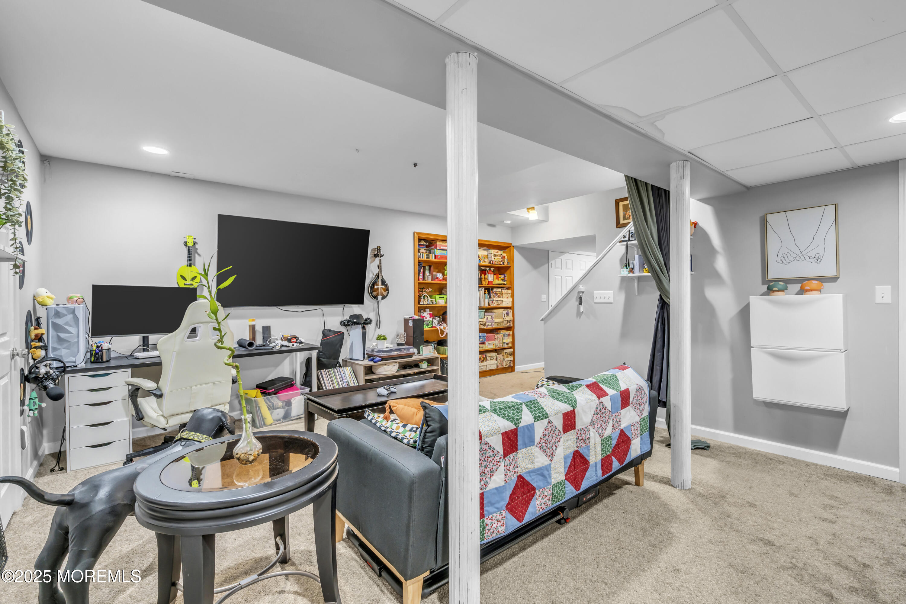 1 Sun Hollow Road Howell, NJ 07731 - Photo 31 of 47 a bedroom with a bed and a flat screen tv