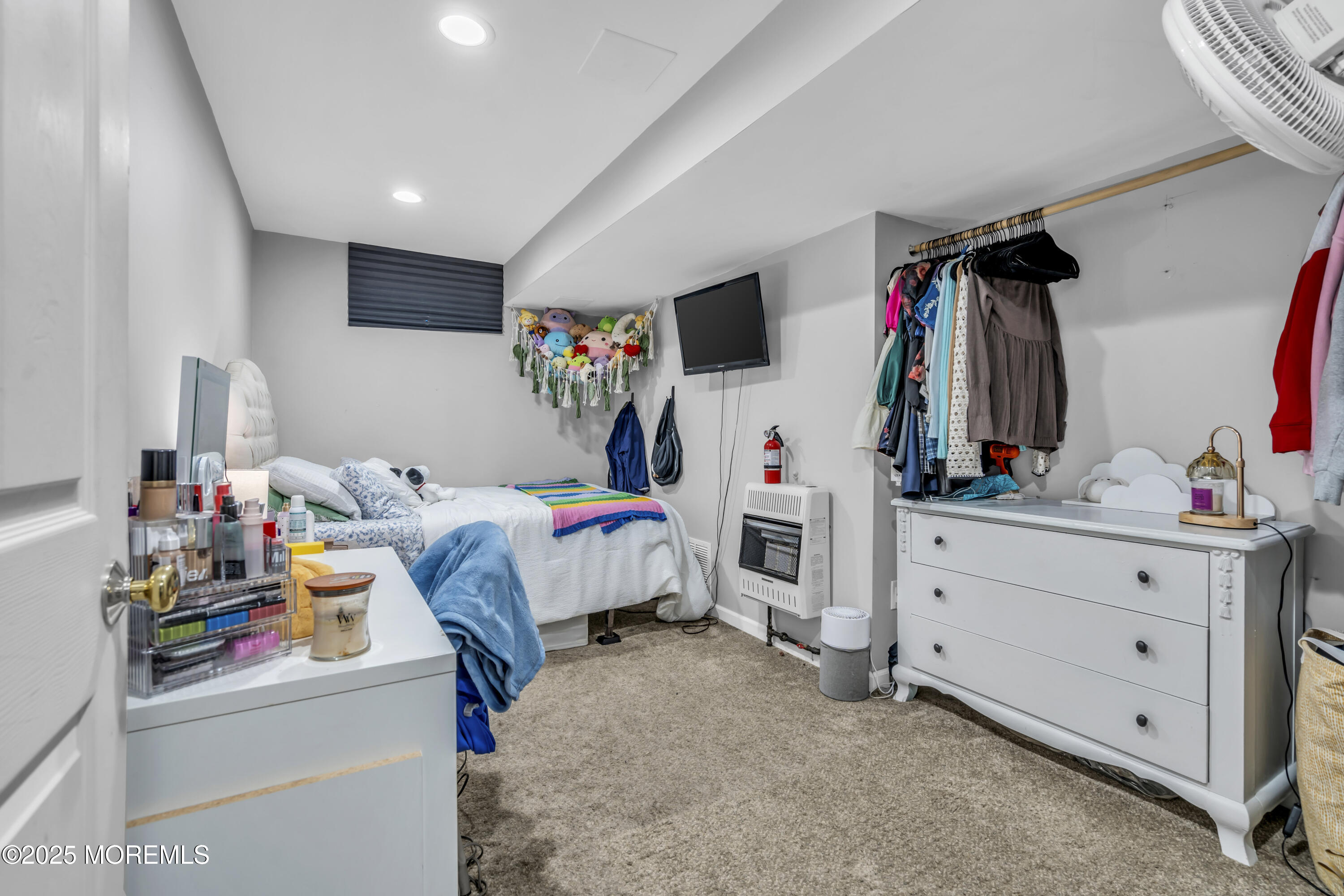 1 Sun Hollow Road Howell, NJ 07731 - Photo 32 of 47 a bed room with a bed and a flat tv screen