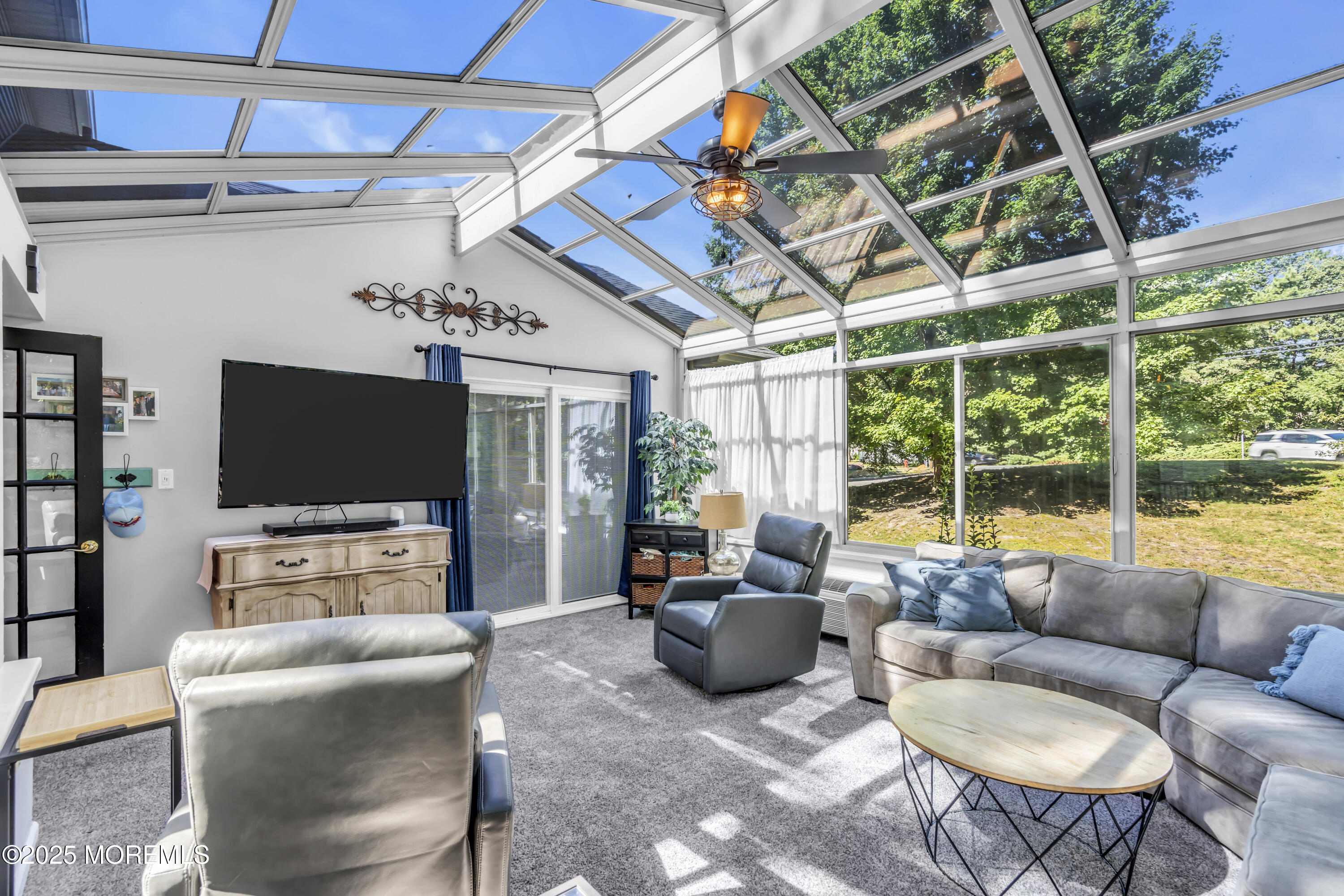 1 Sun Hollow Road Howell, NJ 07731 - Photo 35 of 47 a living room with furniture and a flat screen tv
