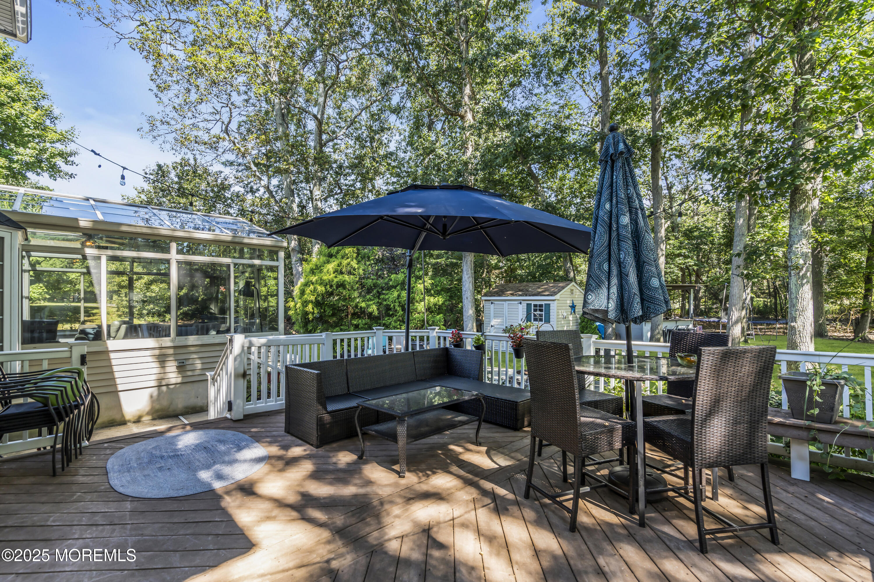 1 Sun Hollow Road Howell, NJ 07731 - Photo 36 of 47 a view of backyard with outdoor seating and trees