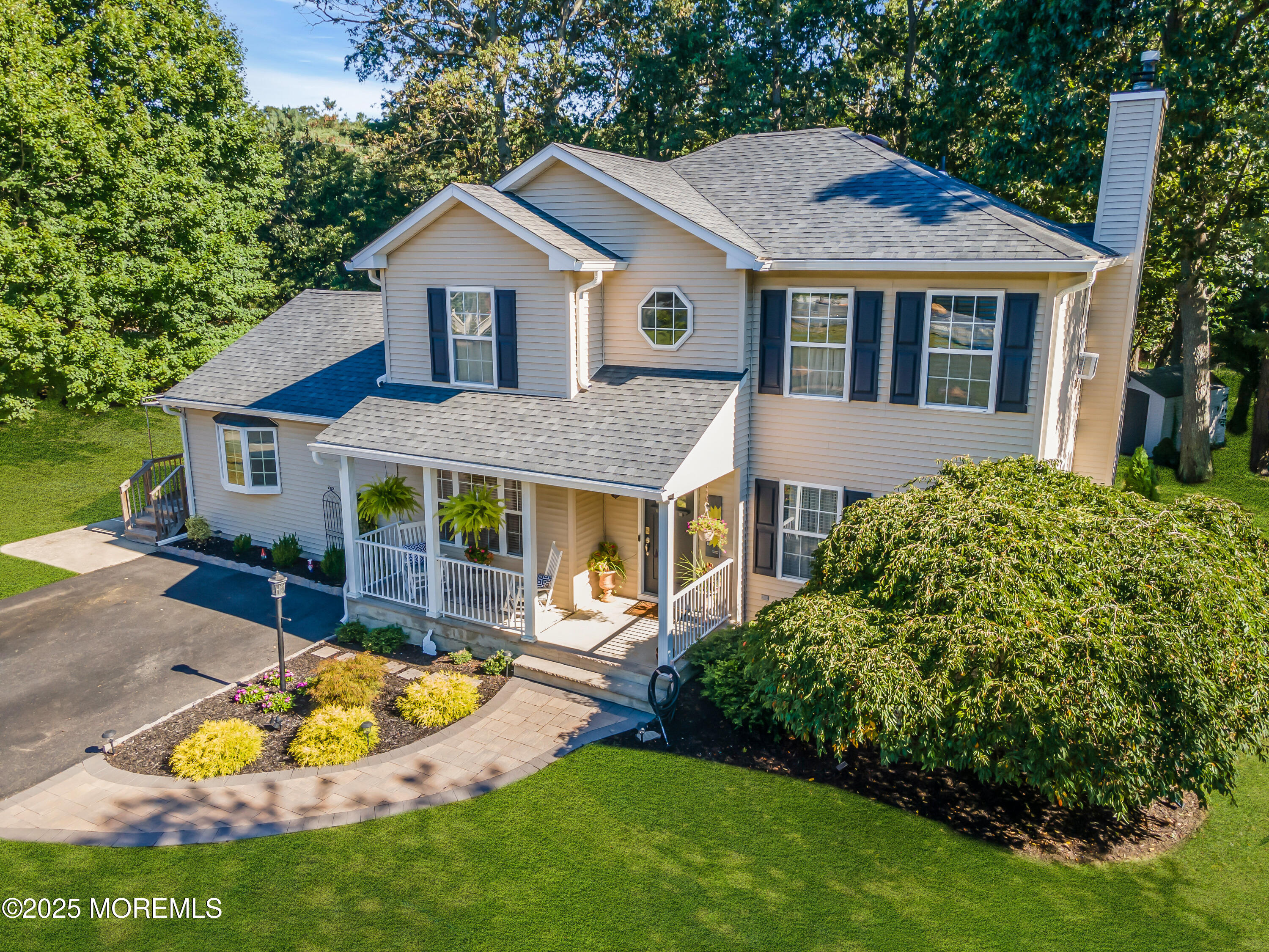 1 Sun Hollow Road Howell, NJ 07731 - Photo 40 of 47 a front view of a house with a yard
