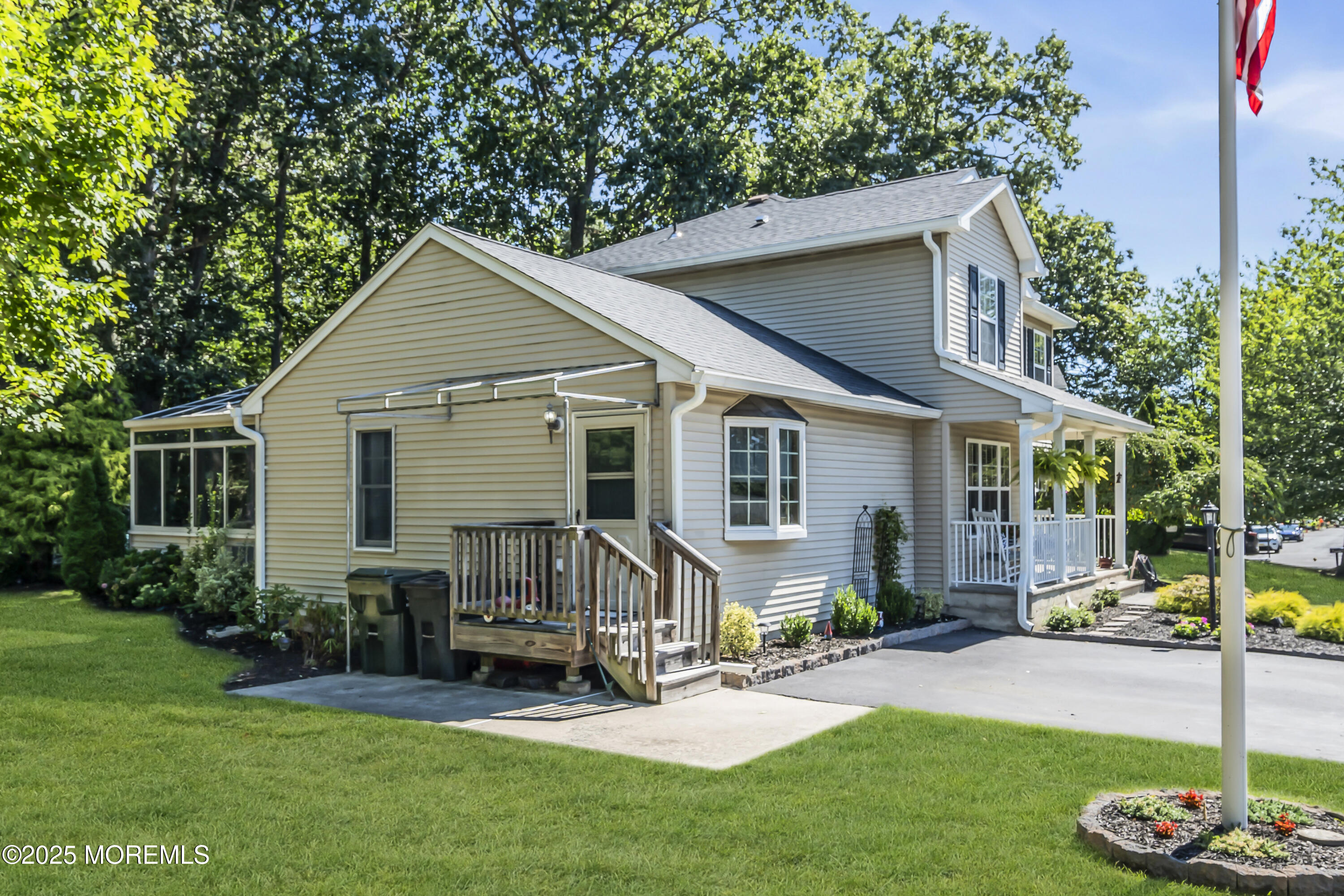 1 Sun Hollow Road Howell, NJ 07731 - Photo 4 of 47 a view of a house with backyard sitting area and garden