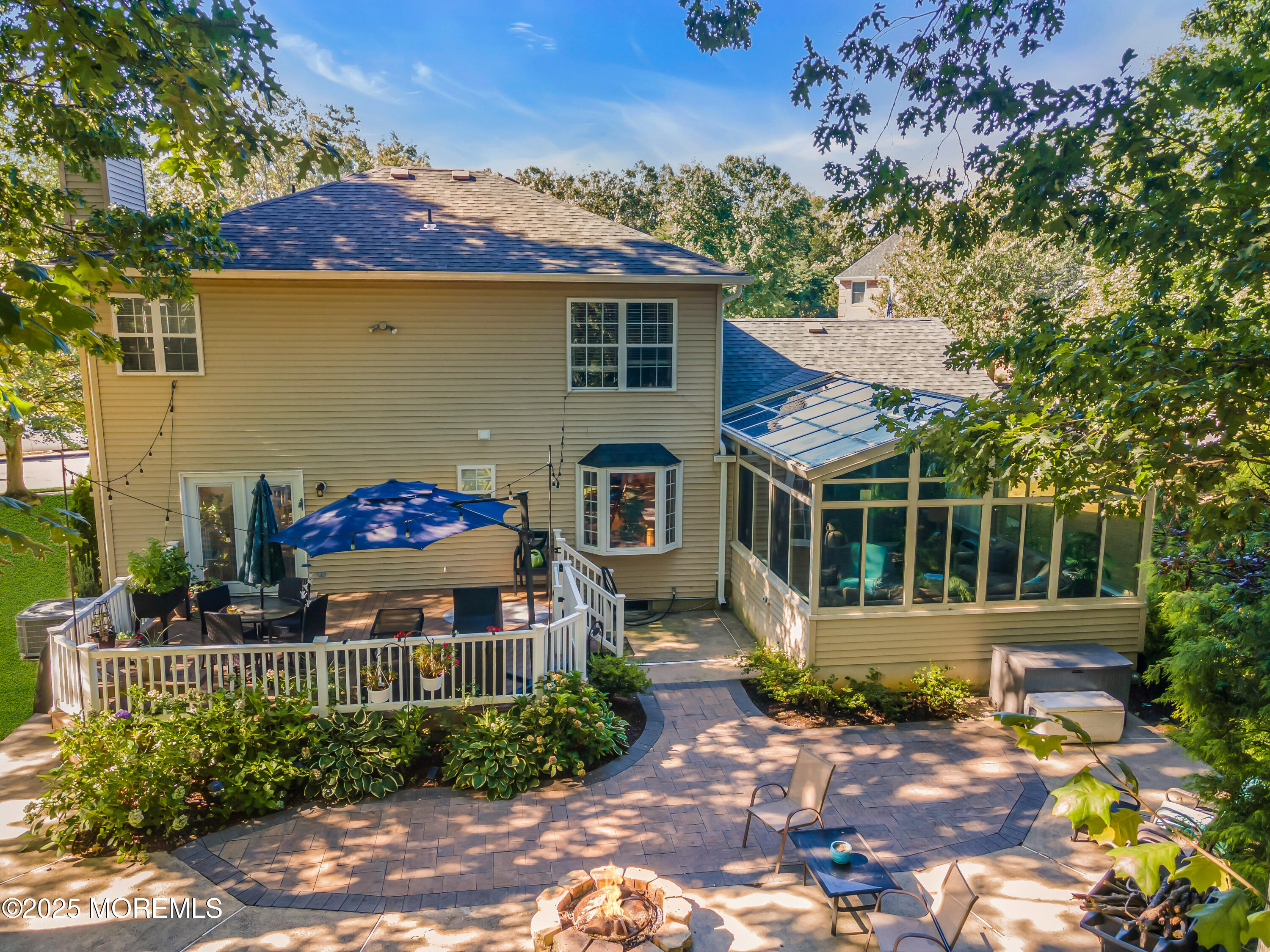 1 Sun Hollow Road Howell, NJ 07731 - Photo 46 of 47 a front view of a house with a garden