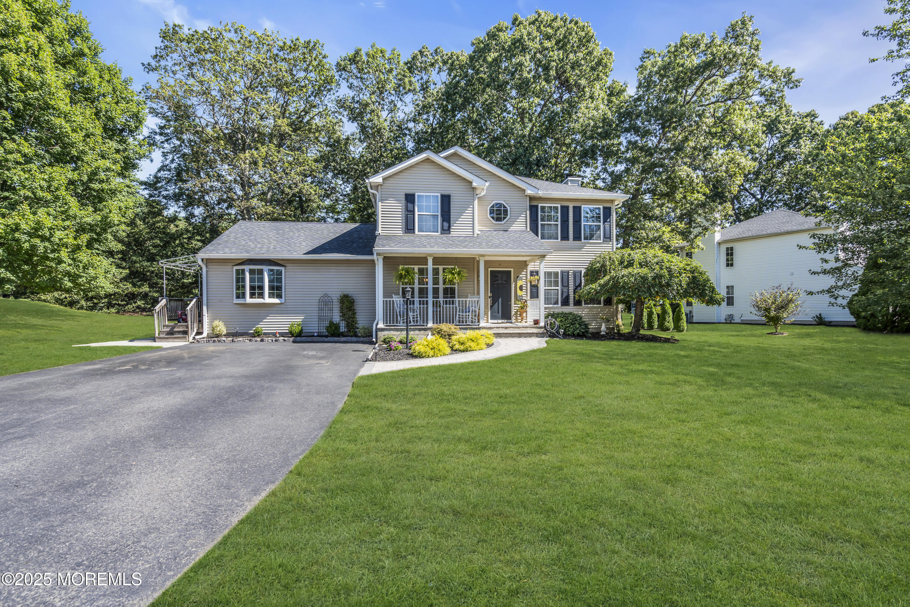 1 Sun Hollow Road Howell, NJ 07731 - Photo 6 of 47 a aerial view of a house with swimming pool and porch
