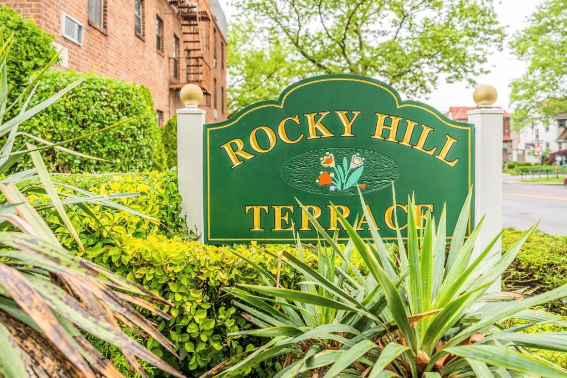 215-43 48th Avenue, Unit 3A Queens, NY 11364 - Photo 15 of 16 a sign that is on a street sign