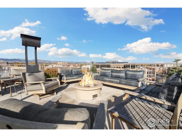 a view of a terrace with seating area