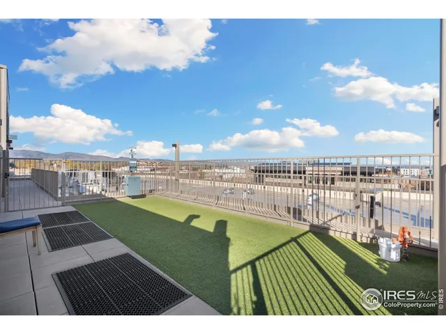 a view of a swimming pool with a lounge chairs