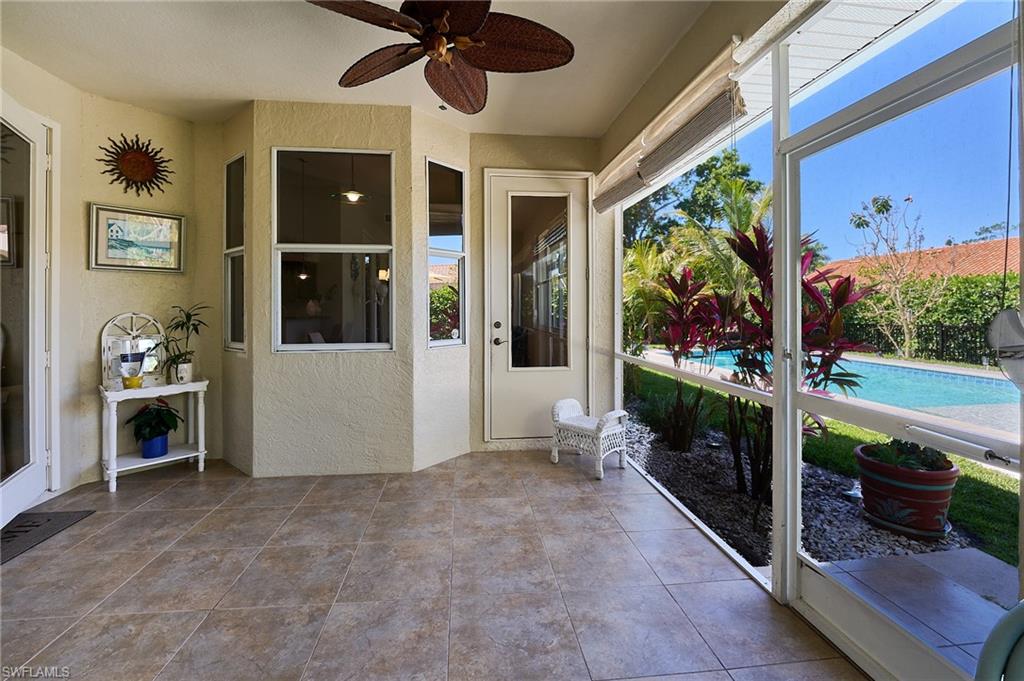 186 Muirfield Circle Naples, FL 34113 - Photo 28 of 36 a view of an entryway with dining area