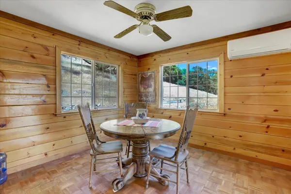 a living room with a couch and a fireplace