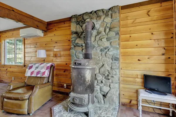 a bedroom with a bed and cabinets