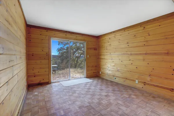 an aerial view of residential house and green space
