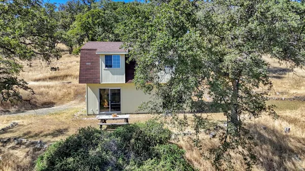 a view of lake with green space