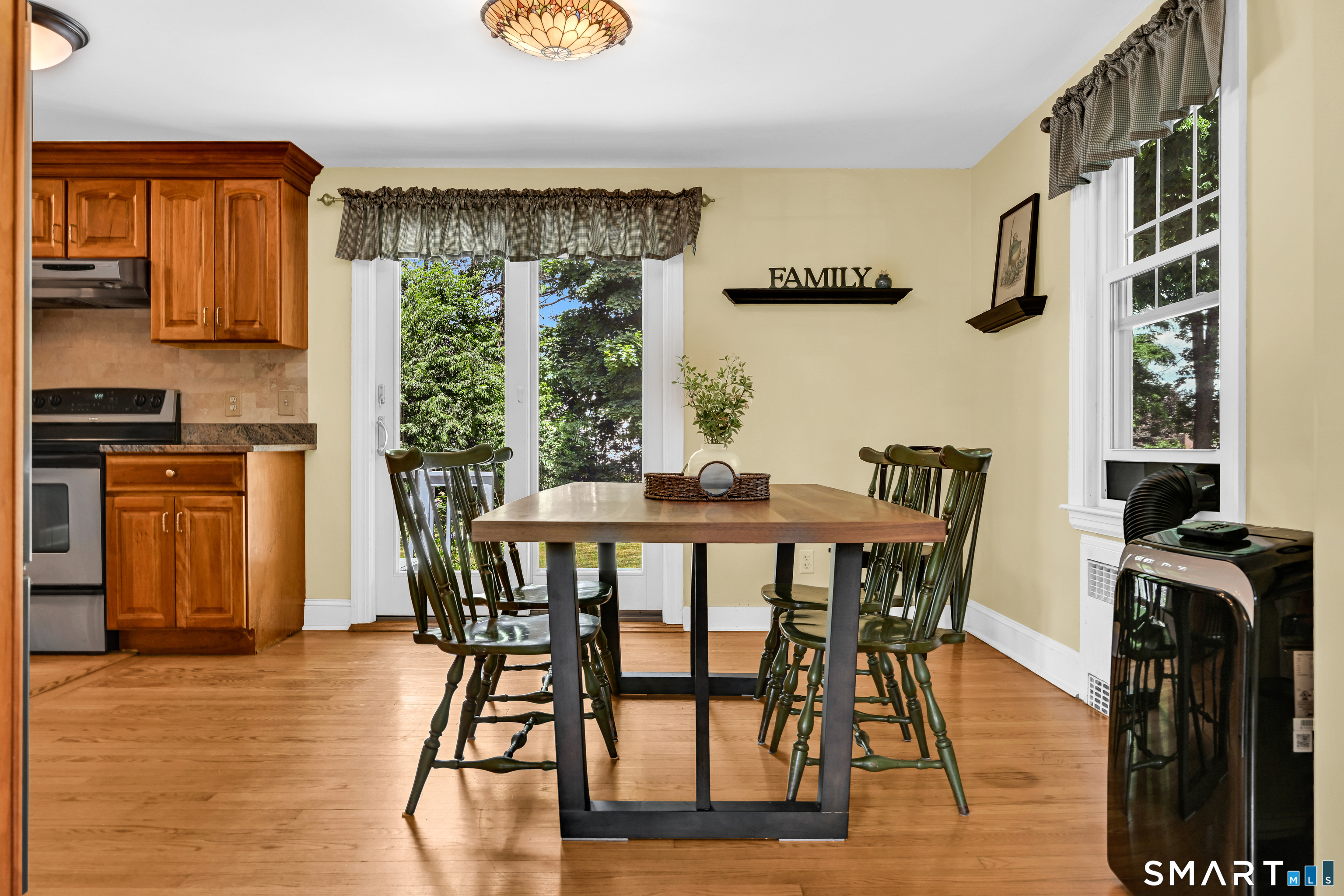 219 Clearfield Road Wethersfield, CT 06109 - Photo 8 of 37 Living Room opens to dining area in kitchen