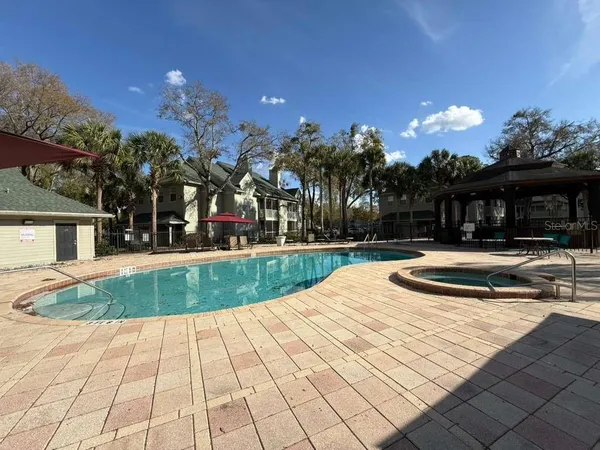 a view of outdoor space with swimming pool