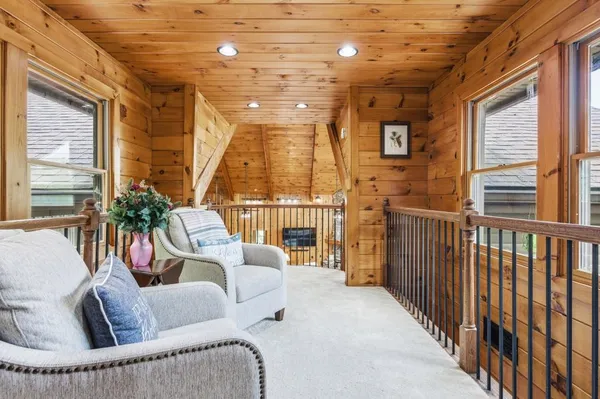 a living room with a table and a window
