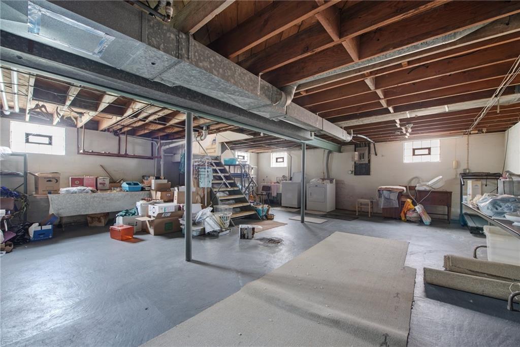 208 Eastern Drive Lower Burrell, PA 15068 - Photo 16 of 25 a view of parking garage with cars