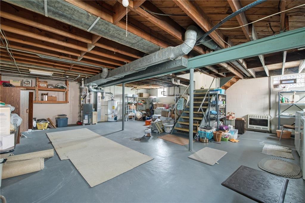 208 Eastern Drive Lower Burrell, PA 15068 - Photo 17 of 25 a view of a garage with chairs