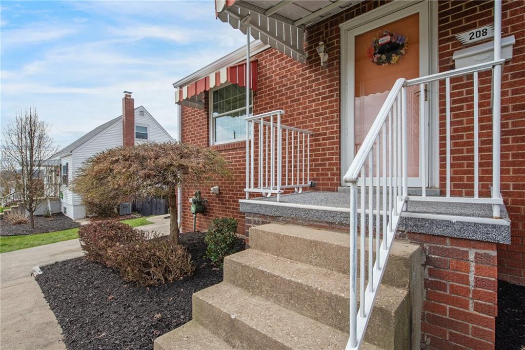 208 Eastern Drive Lower Burrell, PA 15068 - Photo 18 of 25 a front view of a house with a yard