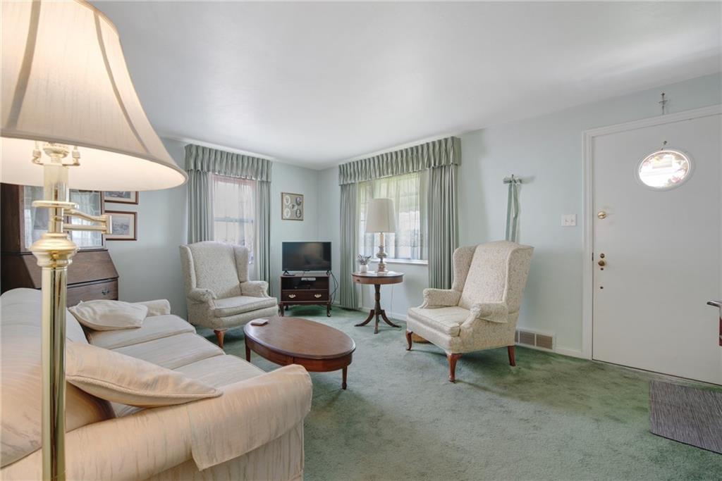 208 Eastern Drive Lower Burrell, PA 15068 - Photo 3 of 25 a living room with furniture and a large window