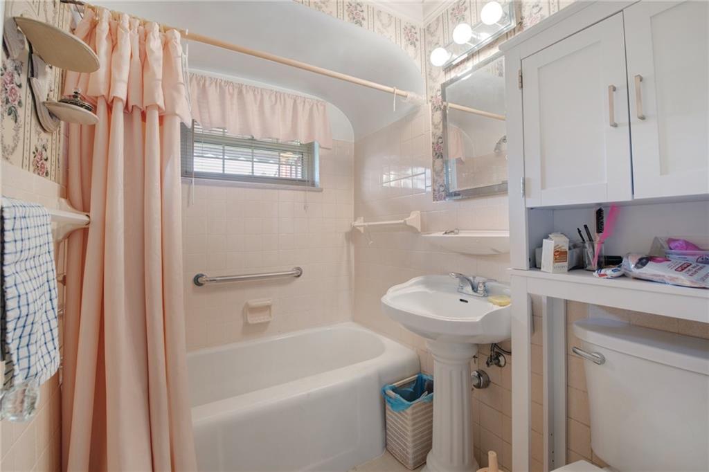 208 Eastern Drive Lower Burrell, PA 15068 - Photo 8 of 25 a bathroom with a sink toilet and shower