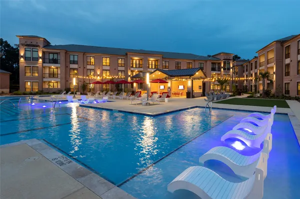 a view of a swimming pool with outdoor space
