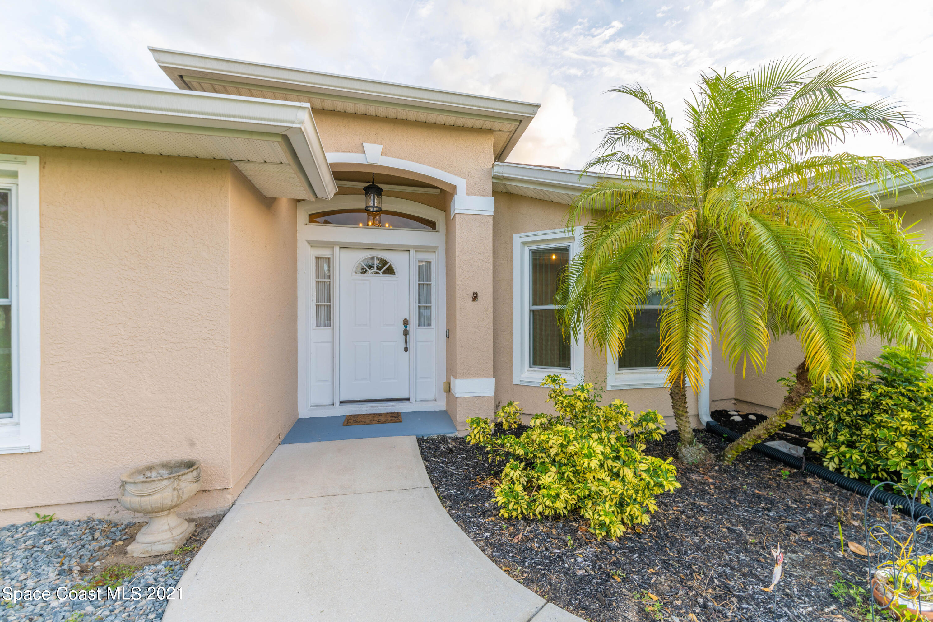 7428 Rodes Place Melbourne, FL 32904 - Photo 1 of 28 NZ7_9874